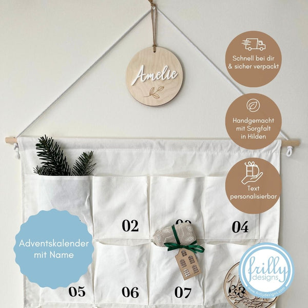 ein weißes Baumwolle Canvas  Kalender für Advent.  Maße: 120 cm hoch x 63 cm breit mit 24 Taschen